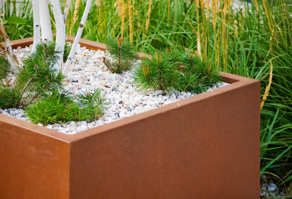 Cortenstalen afboording | Cortenstalen plantenbak | Cortenstaal in de tuin | Cortenstaal Vlaeminck